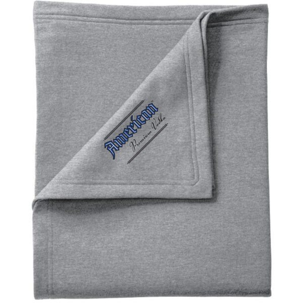Grey fleece blanket with the logo set on the diagonal of the folded corner